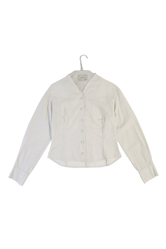 'Magnolia' Blouse à col montant avec manche volumineuse - Crème